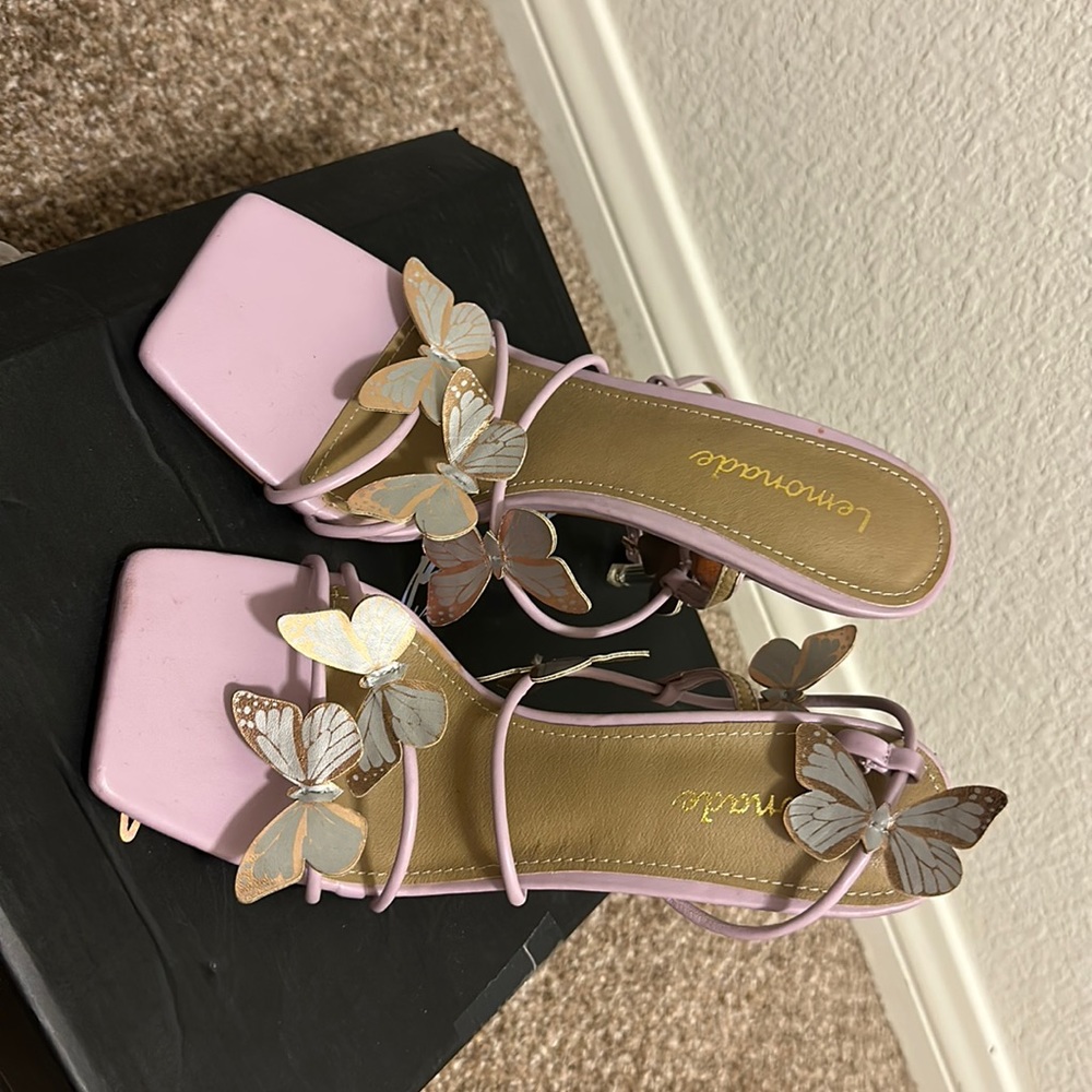 Brand new butterfly heels super cute!!